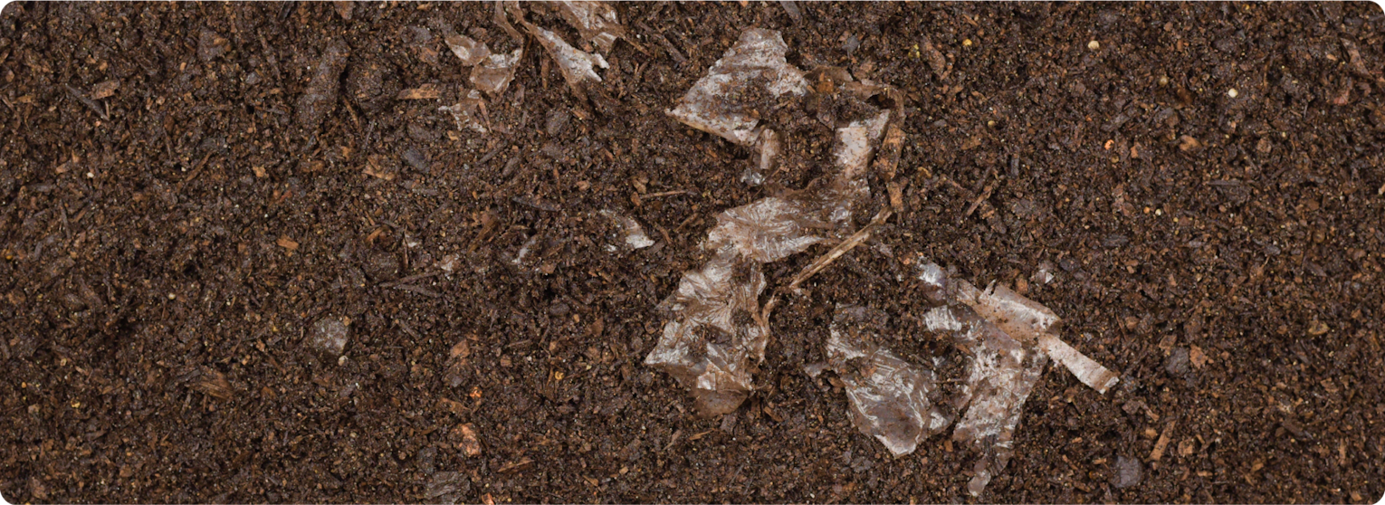 Packaging being composted in soil